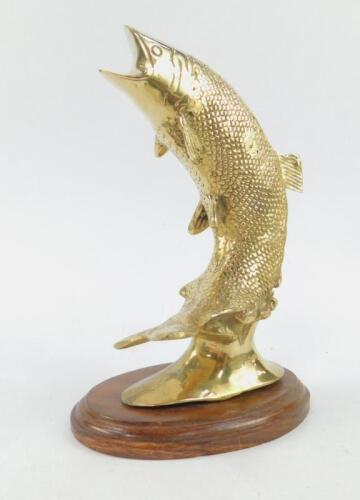 A brass figure of a leaping salmon