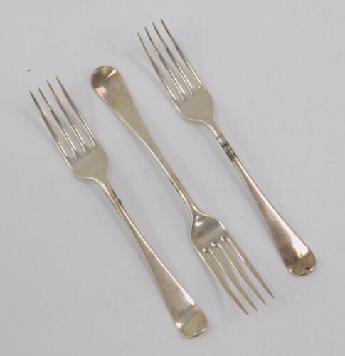 Three George III silver table forks