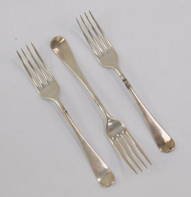 Three George III silver table forks