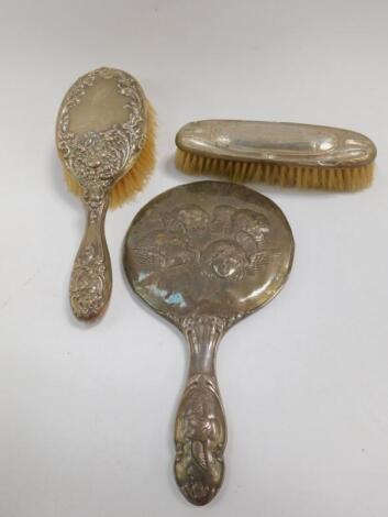 An Edward VII silver backed hand mirror