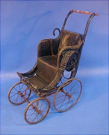 A late Victorian wicker loom child's push chair £50-80