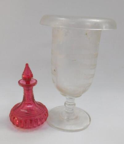 A Victorian cranberry glass scent bottle