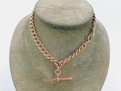 A 9ct rose gold curb link Albert chain