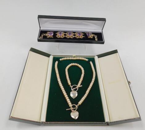 An Ernest Jones cultured pearl and silver necklace and bracelet set