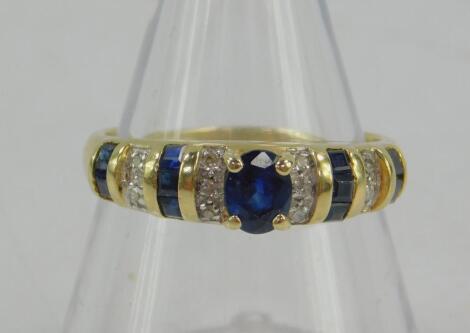 A 14ct gold sapphire and diamond ring