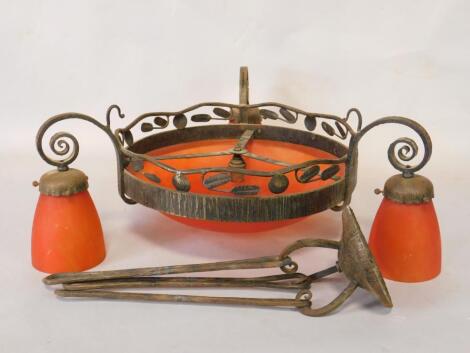 A French early 20thC cast iron and mottled orange glass ceiling light