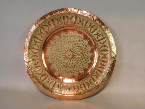 An Indian copper table tray top