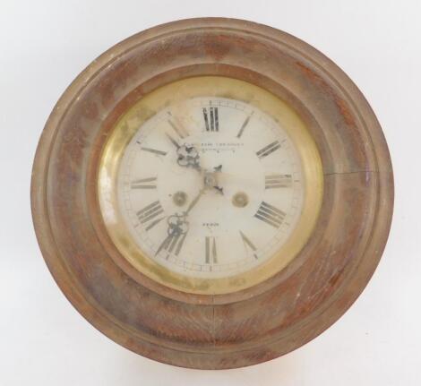 A French early 20thC circular oak and pine cased wall clock