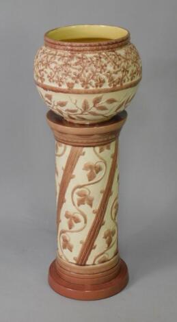 A Burmantofts late 19thC pottery jardiniere on stand