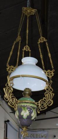 A Continental Art Nouveau late 19thC brass and pottery hanging oil lamp