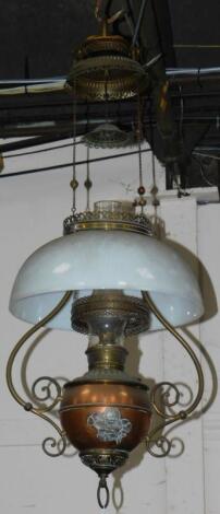 A Continental late 19thC copper and brass hanging oil lamp