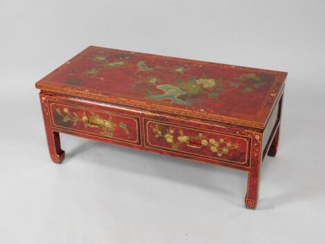 A Chinese red lacquer occasional table