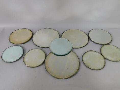 Ten circular mirrored glass cake stands or wall mirrors