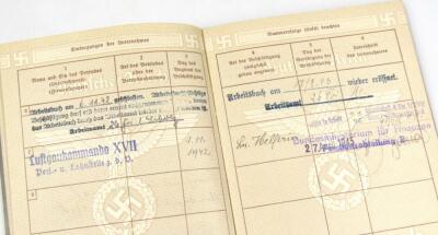 A Third Reich Arbeitsbuch in the name of Wilsech numbered 26FRI/000494 - 9