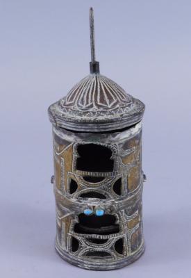 A Middle Eastern metal dome shaped prayer wheel