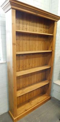 A large pine open bookcase