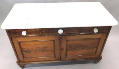 A 19thC flame mahogany and marble top wash stand