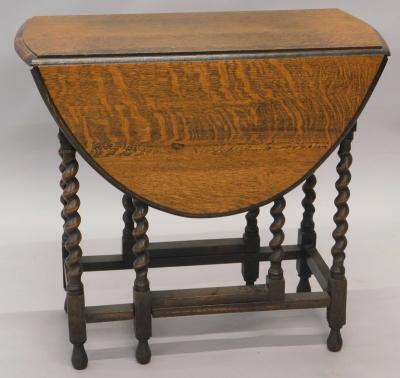 An early 20thC barley twist gateleg dining table