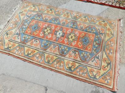 A rectangular hearth rug