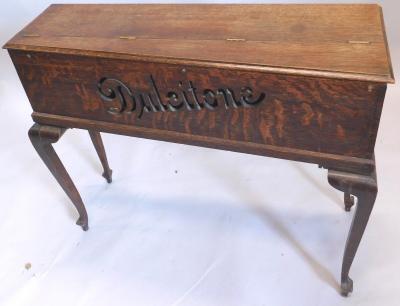 An early 20thC Dulcitone oak cased square piano cabinet