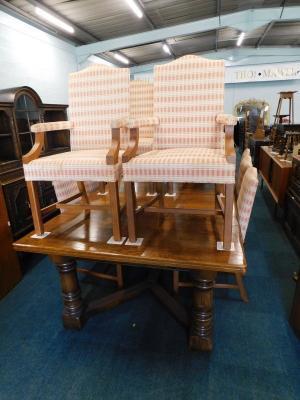 A large Victorian style oak draw leaf dining table