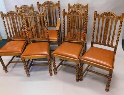 A set of eight oak dining chairs