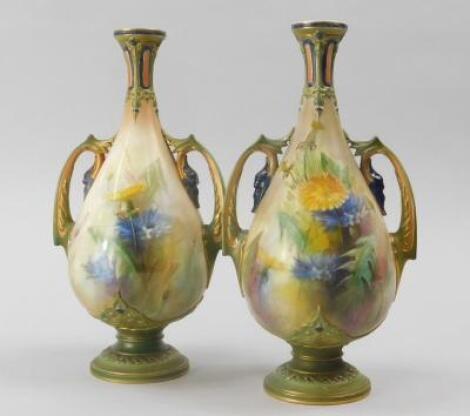 A pair of Hadley's Worcester porcelain vases