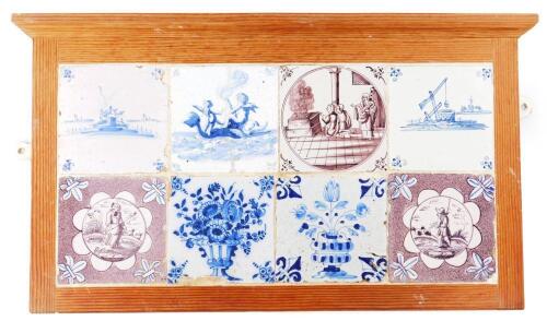 A panel of various 18thC English and Dutch Delft tiles