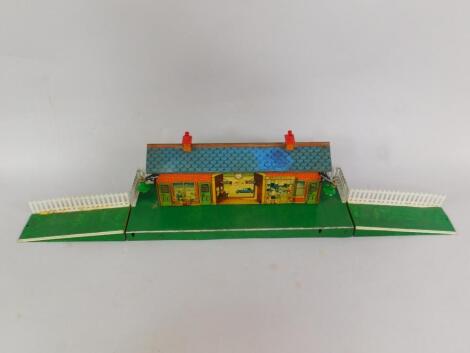 A Hornby tin plate station