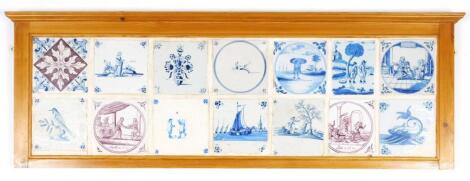 A panel of fourteen English and Dutch Delft tiles