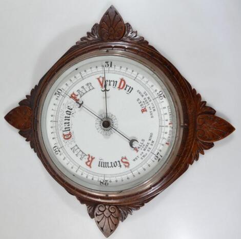 An early 20thC oak wall barometer
