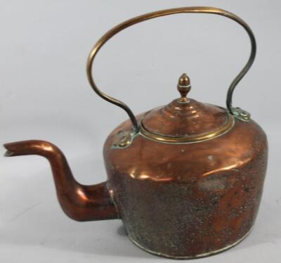 An oversized early 20thC copper kettle