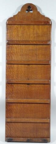 A 20thC oak hanging church hymn number board