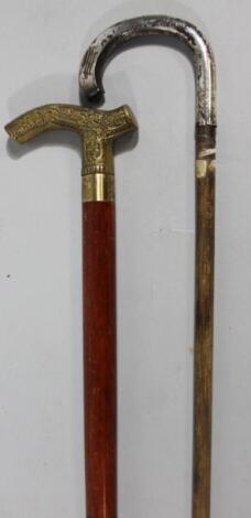 A 20thC decanter walking stick