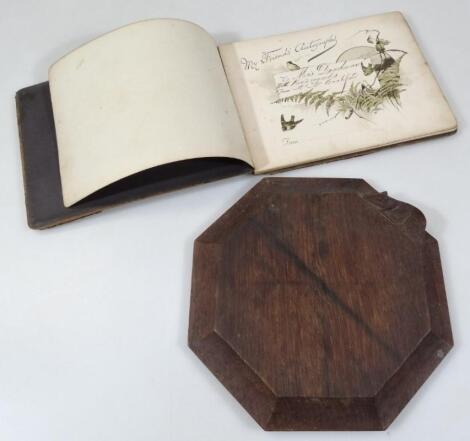 A 20thC oak bread board