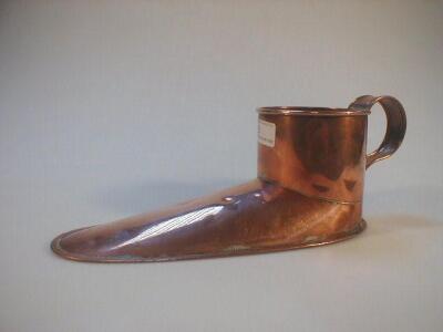 A 19thC copper "Slipper" ale muller