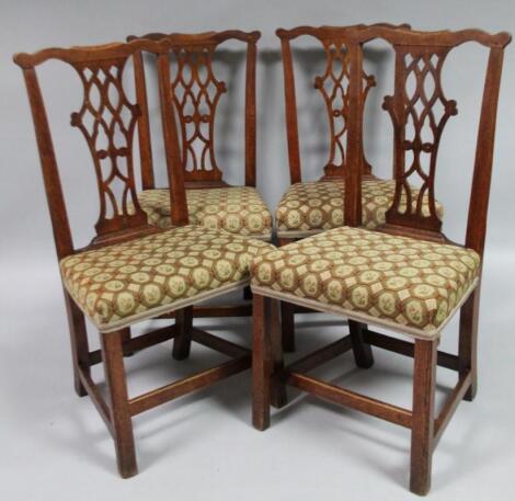 A set of four early 19thC oak Chippendale design chairs