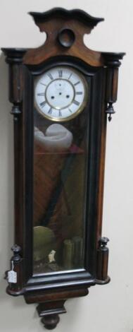 A 19thC walnut and ebonised double weight Vienna wall clock