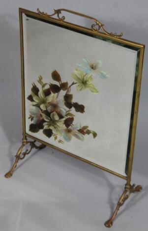 An early 20thC painted glass fire screen