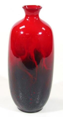 A mid 20thC Doulton flambe vase