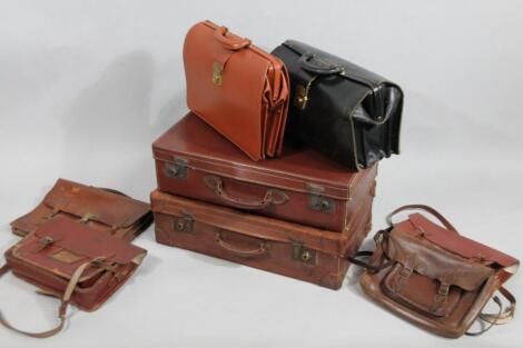 Various brown leather and other travel cases