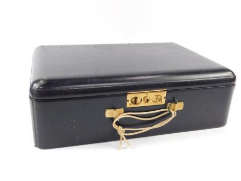 A Dunhill black leather cigar case