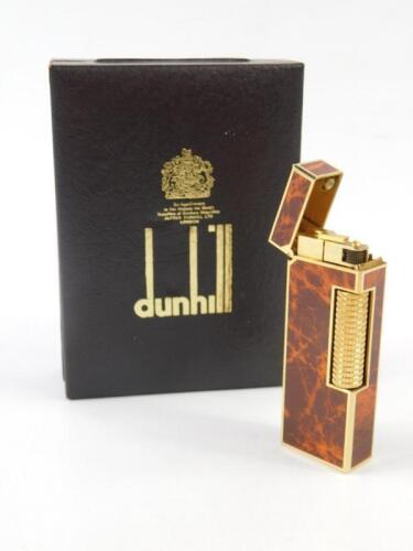 A Dunhill gold plated and faux wood pocket lighter