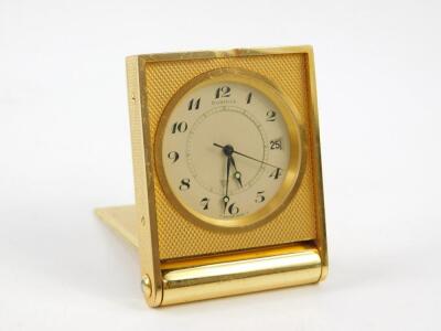 A Dunhill brass travel clock