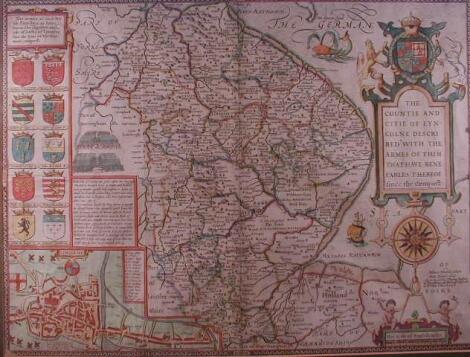 A hand coloured antiquarian map of Lincolnshire with Coats of Arms and