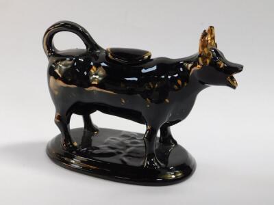 A Jackfield 19thC black and gilt cow creamer - 4