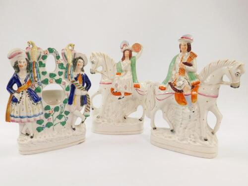 A pair of mid 19thC pottery flatback figures modelled as The Prince & Princess of Wales on horseback