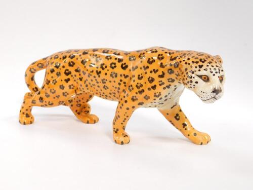 A Beswick pottery figure modelled as a Leopard