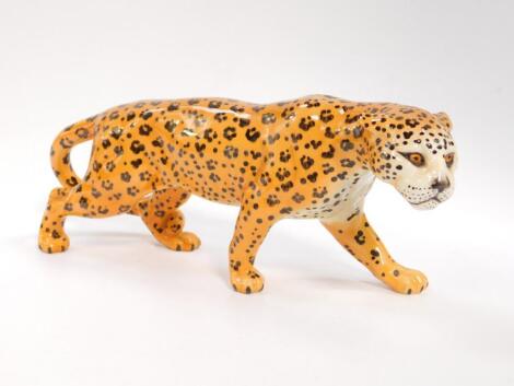 A Beswick pottery figure modelled as a Leopard