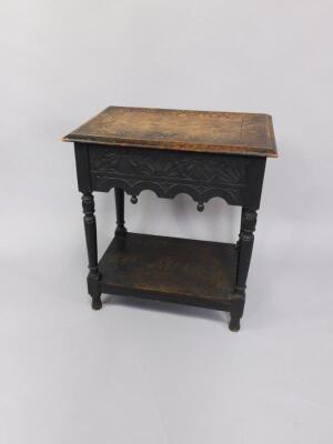 A Victorian ebonised Jacobean style side table